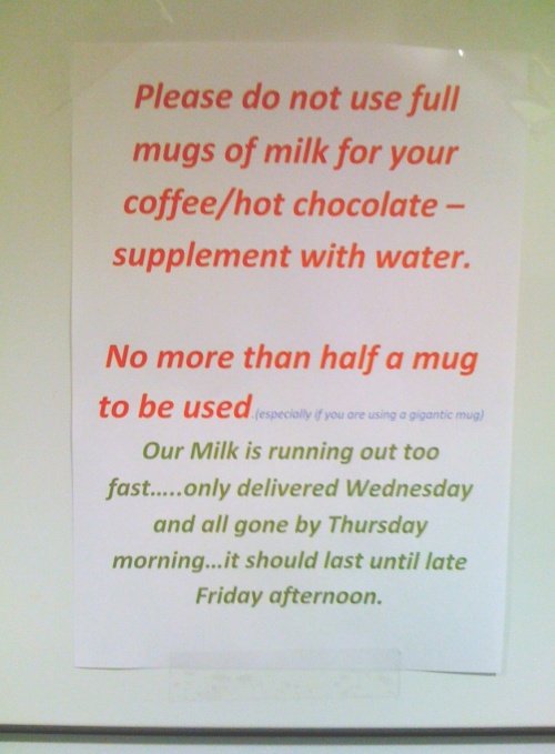 kitchen notice about using too much milk
