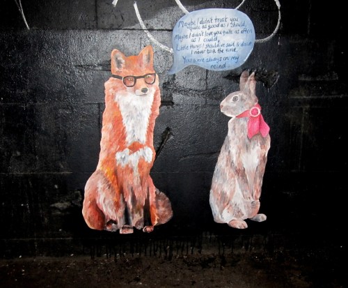 Graffiti on wall of fox and rabbit